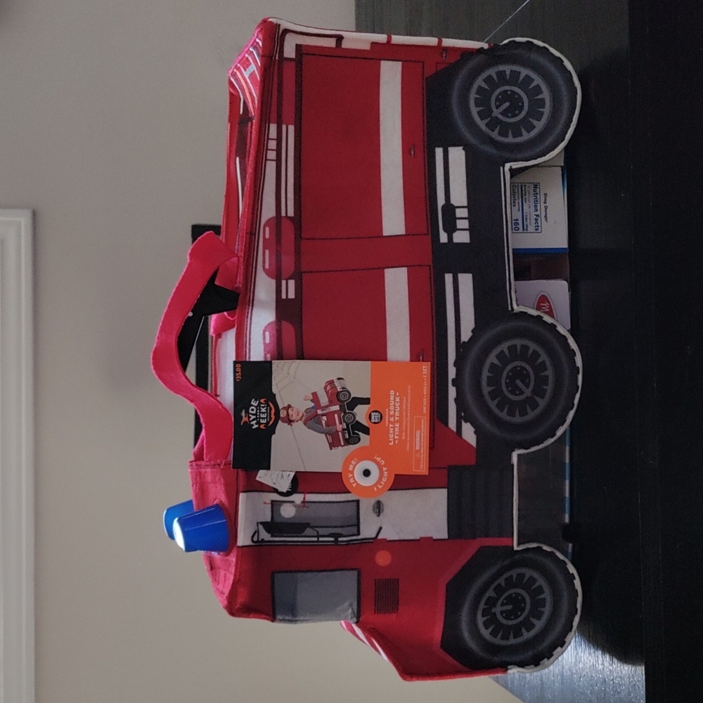 Light and sound fire truck  one size fits most.